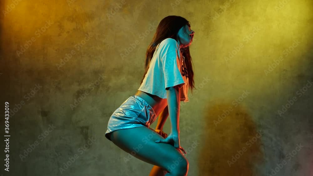 Beautiful Asian girl dancing freestyle, twerk, hip hop, dancehall