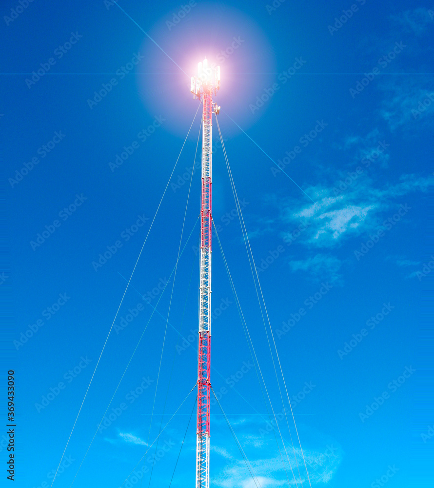 telecommunication high tower cellular communication, internet and 5G communication, image shows intersection and interaction social links through 5G and mobile networks telecommunication high tower cellular communication, internet and 5G communication, image shows intersection and interaction social links through 5G and mobile networks