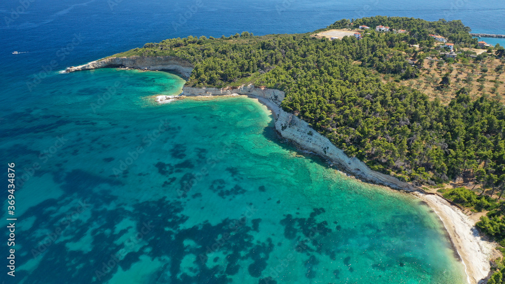 Obraz premium Aerial drone panoramic photo of secluded paradise beach and bay of Spartines with crystal clear turquoise sea, Alonissos island, Sporades, Greece 