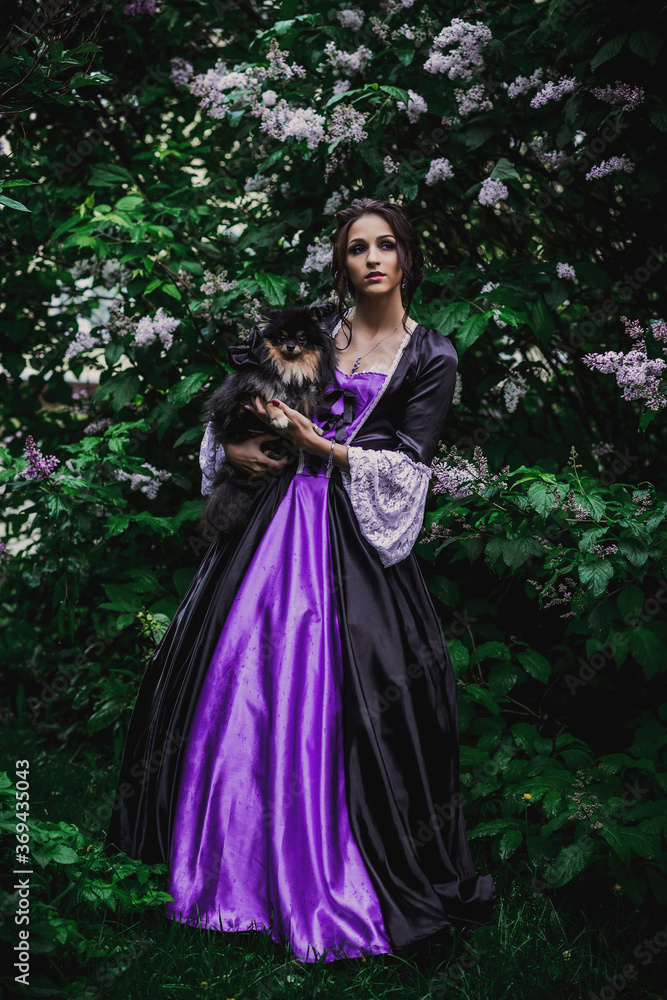 Lady in black and purple baroque dress Lady in black and purple baroque dress