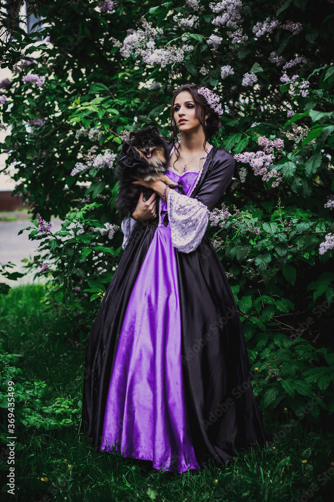 Lady in black and purple baroque dress Lady in black and purple baroque dress
