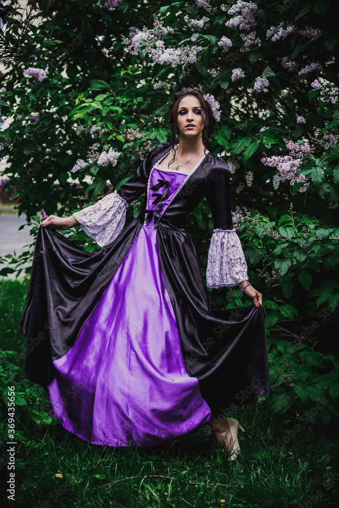 Lady in black and purple baroque dress Lady in black and purple baroque dress