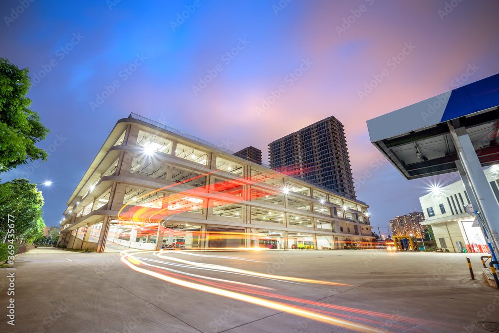 Night view of a three-dimensional parking lot, Beijing, China. Night view of a three-dimensional parking lot, Beijing, China.