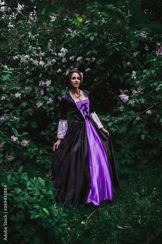 Lady in black and purple baroque dress