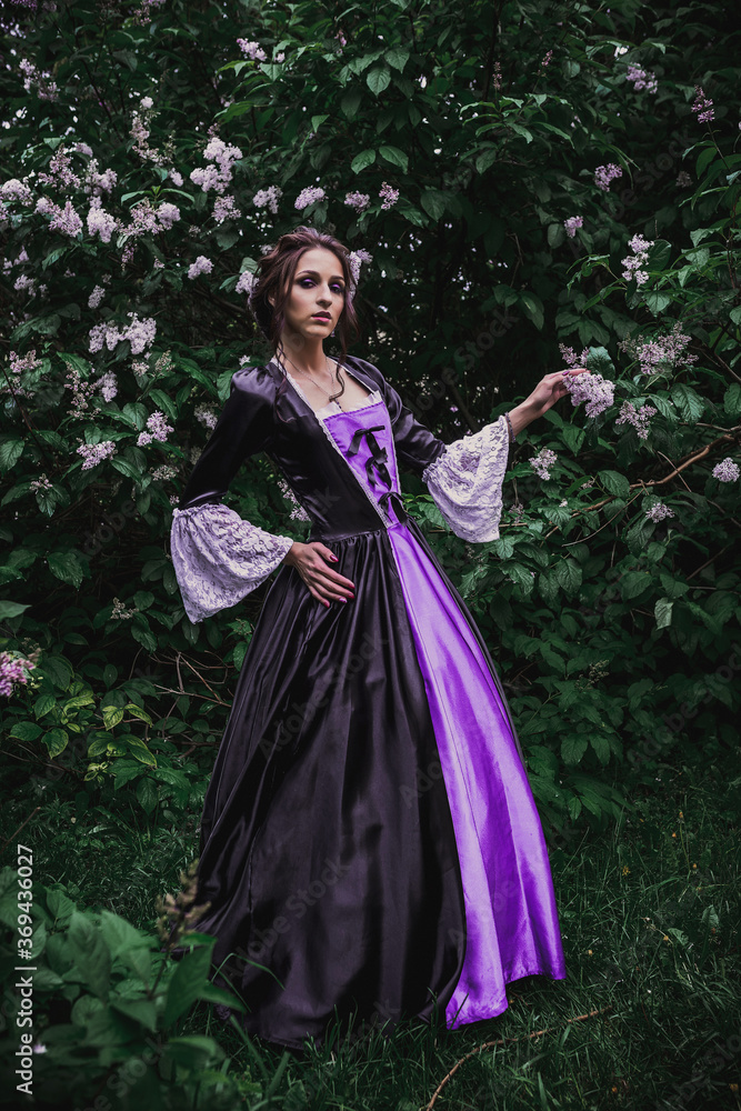 Lady in black and purple baroque dress