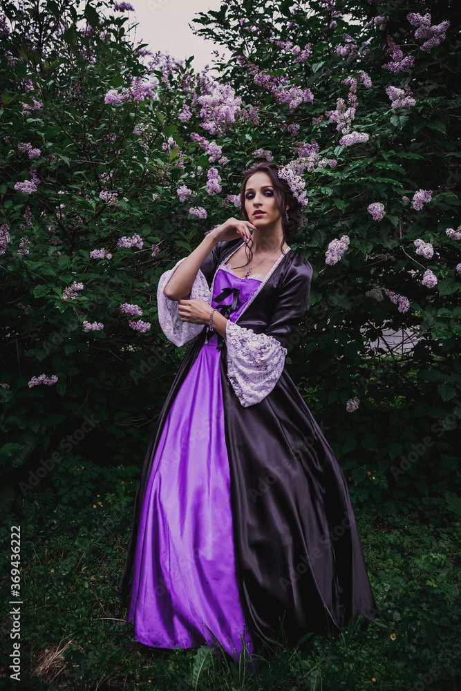 Lady in black and purple baroque dress