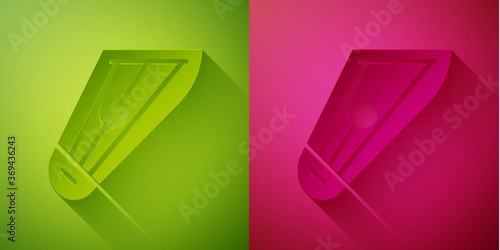 Paper cut Musical instrument kankles icon isolated on green and pink background. Paper art style. Vector.