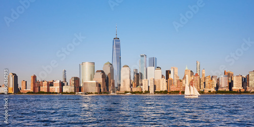 New York City skyline in a beautiful summer afternoon, USA.