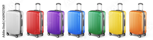 Fotografie, Obraz Stylish Colorful Suitcase on wheels isolated on white