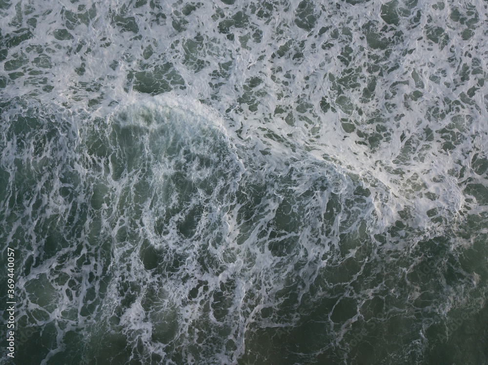 Aerial photo of a small surf break off the coast of New Zealand. Aerial photo of a small surf break off the coast of New Zealand.