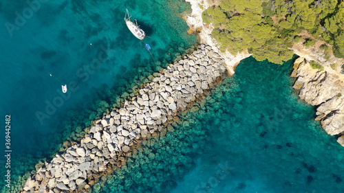 Aerial drone photo of famous small fishing port and village of Votsi in island of Alonissos, Sporades, Greece