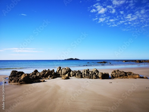 Sisters Beach - beautiful blue sky day on the north west Tasmanian coast with white sands and aqua blue seas - Australia photo