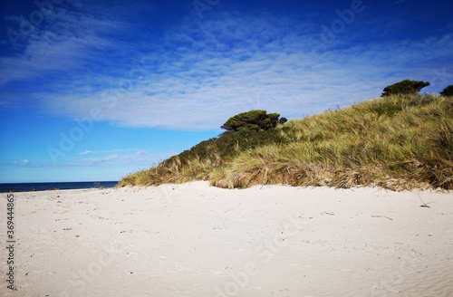 Sisters Beach - beautiful blue sky day on the north west Tasmanian coast with white sands and aqua blue seas - Australia