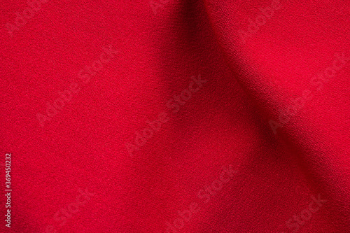 Red fabric cloth texture background close up © Kwangmoozaa