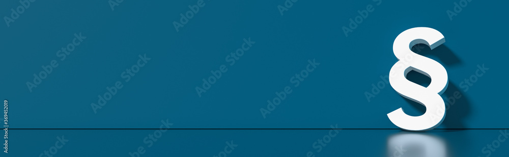 Paragraph / Section sign standing on the floor - Symbol of Law and Justice, with lots of copy space for your individual text Paragraph / Section sign standing on the floor - Symbol of Law and Justice, with lots of copy space for your individual text