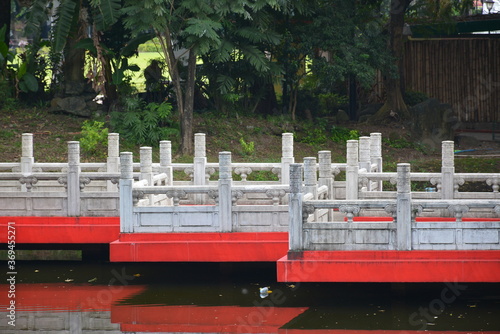 Chinese garden bridge at Rizal park in Manila, Philippines photo