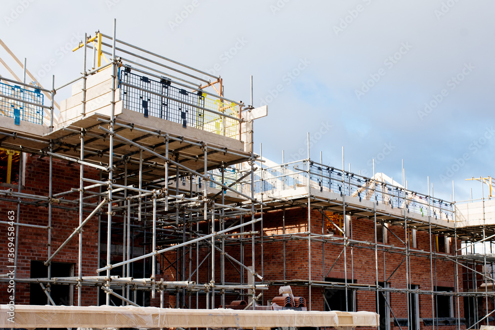 Loading platform made of scaffold system on housing development construction site