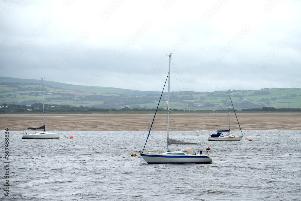 some boats in the bay in autumn some boats in the bay in autumn