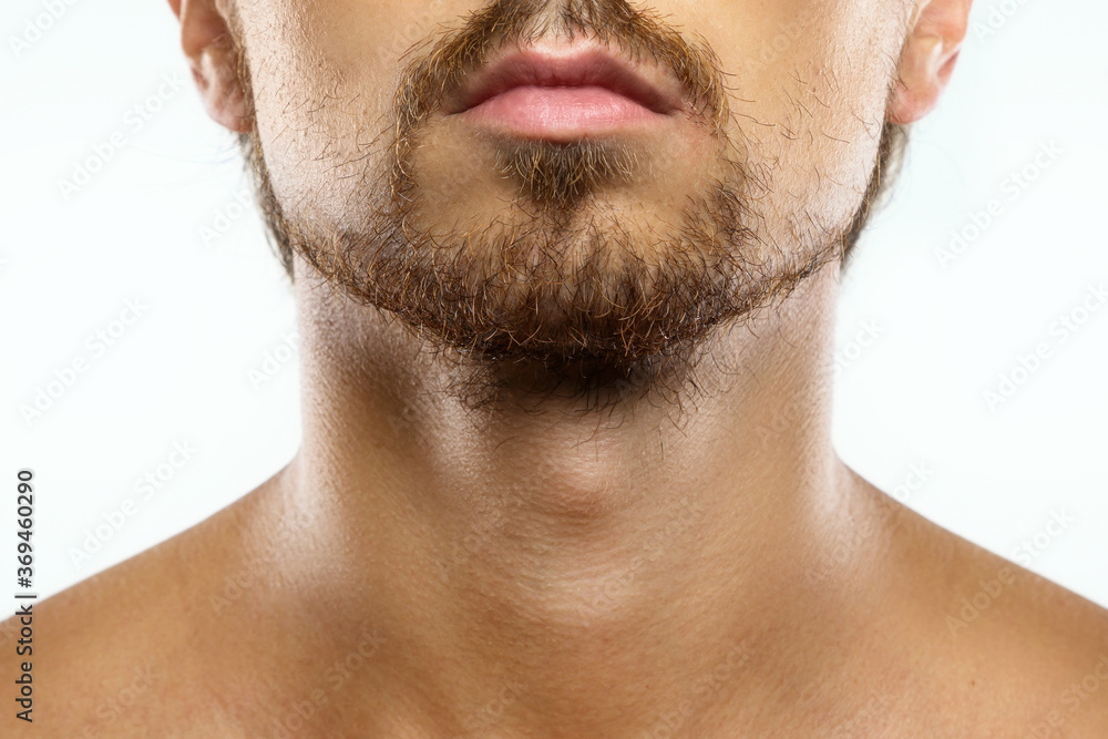 Unshaved man with a unkempt beard