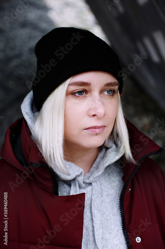 Young millennial hipster teenager female portrait close up, blonde young woman