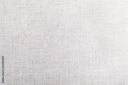 texture of light beige linen fabric top view