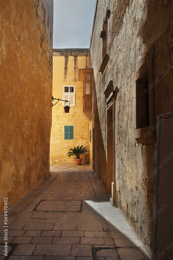 Little old European cobblestone street in Mdina, Malta, Europe Little old European cobblestone street in Mdina, Malta, Europe