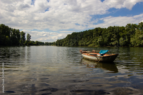 Fototapeta Naklejka Na Ścianę i Meble -  Wooden boat on a river in germany
