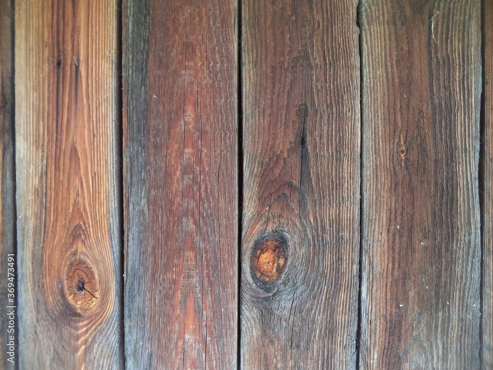 Fototapeta premium The dark background of vertical planks. Background for websites. Wooden structure, pattern