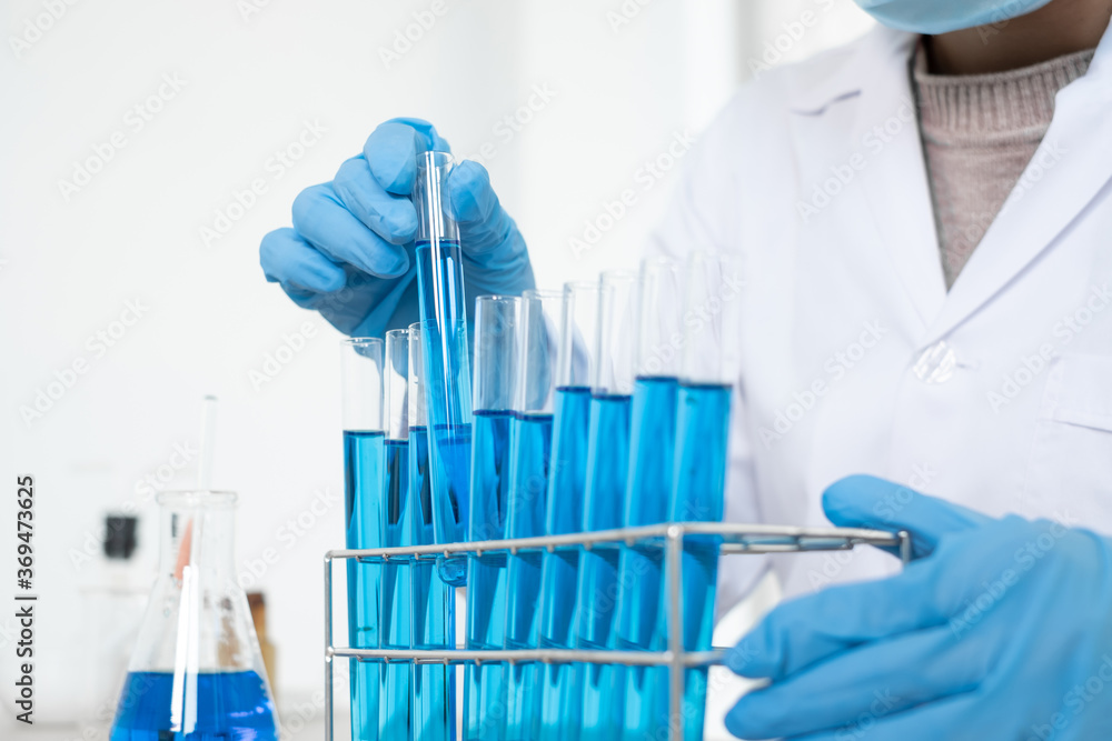 Medical scientists have experimented with liquid chemicals in vitro to analyze viral data in chemical laboratories. Scientific research concepts Medical scientists have experimented with liquid chemicals in vitro to analyze viral data in chemical laboratories. Scientific research concepts