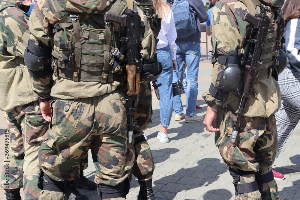 army soldiers at Minsk street in uniform army soldiers at Minsk street in uniform