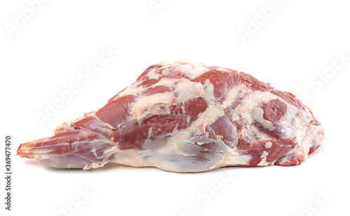 Raw leg of mutton on a bone on a white isolated background. Sheep meat close-up.A fresh piece of mutton. horizontal view.