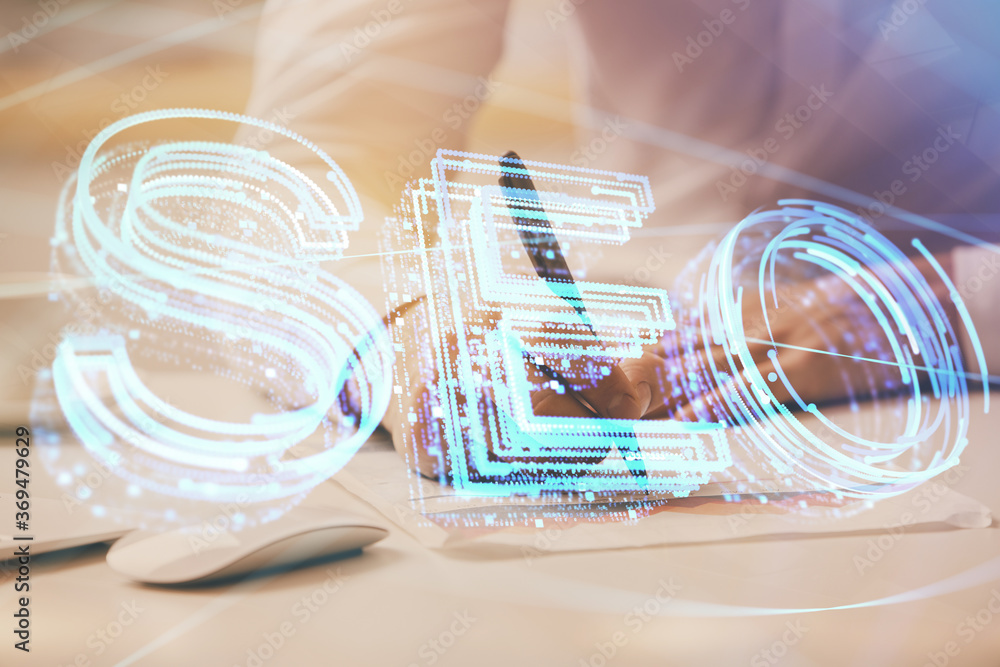 Man hands writing. With double exposure seo drawings. Man hands writing. With double exposure seo drawings.