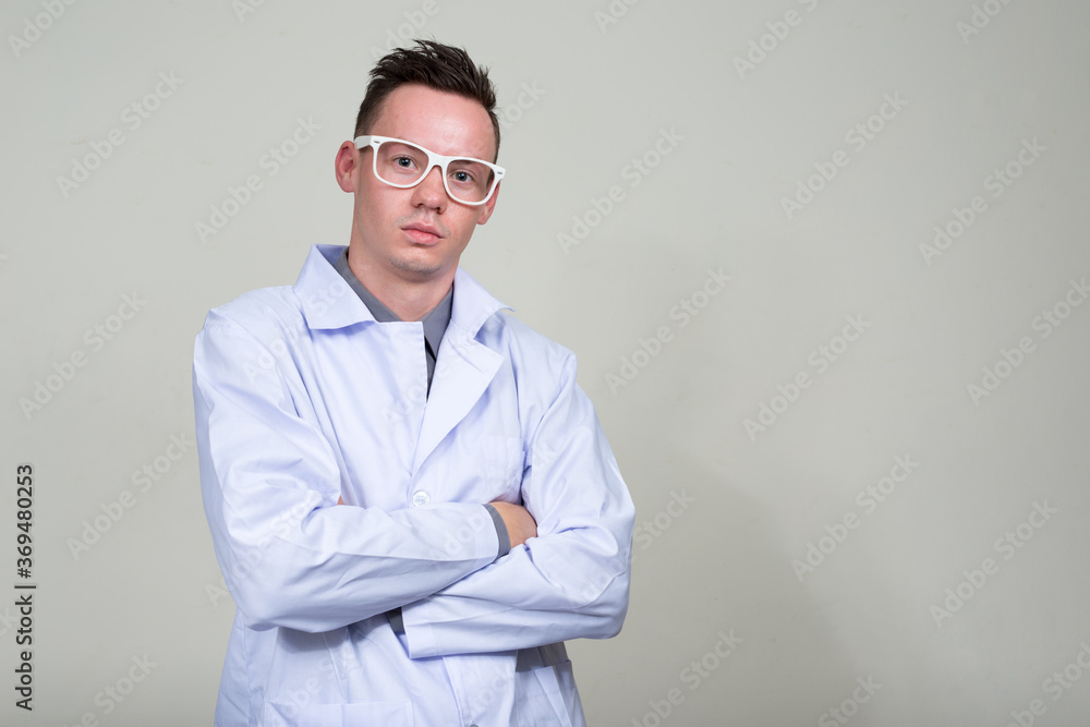 Portrait of young man doctor with eyeglasses Portrait of young man doctor with eyeglasses