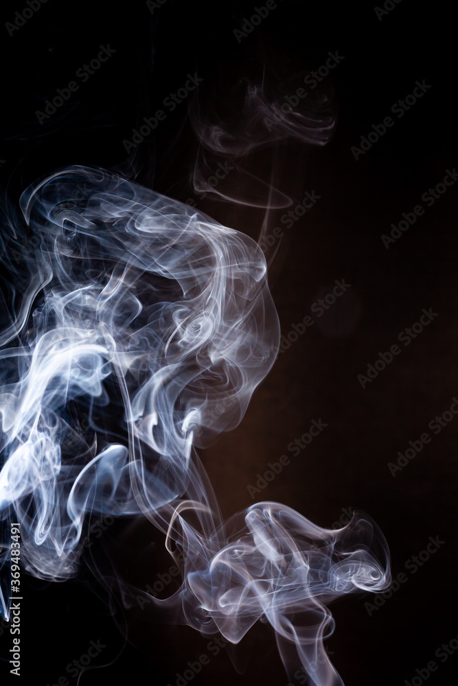 Fototapeta premium Smoke motion on black background.