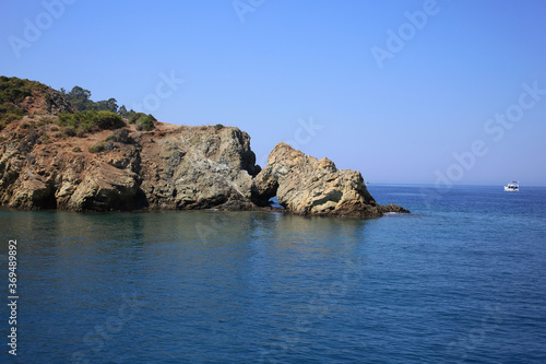 Rocks with a cave in the mediterranean sea in Turkey.