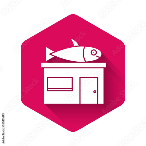 White Seafood store icon isolated with long shadow. Facade of seafood market. Pink hexagon button. Vector..