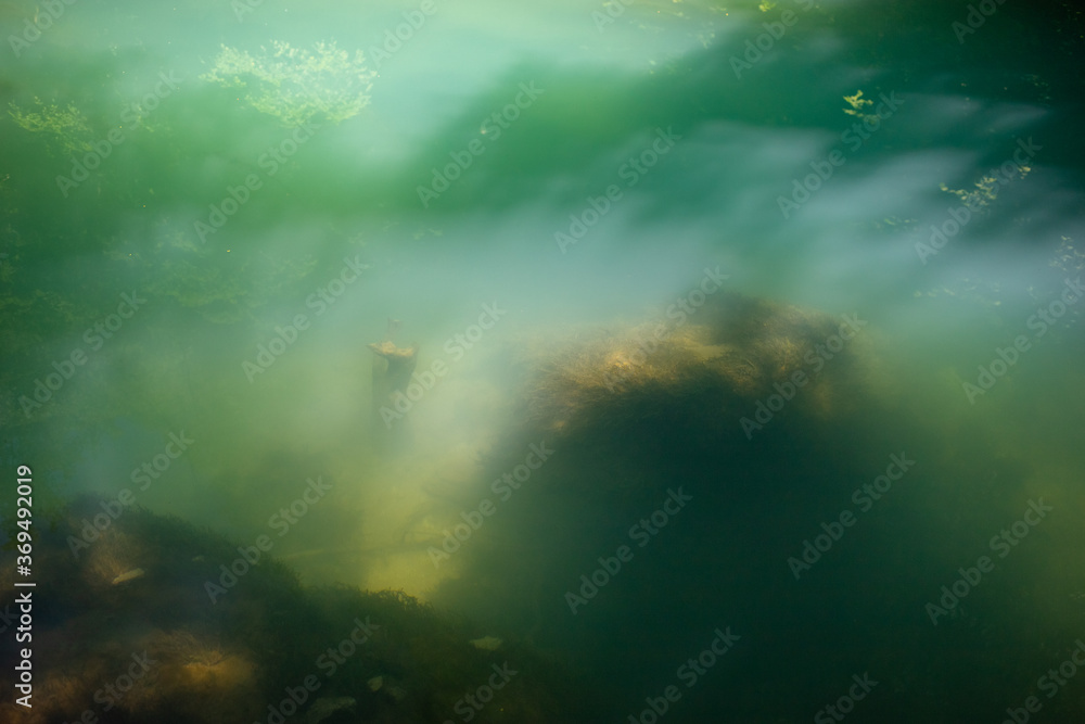 Krupajsko Vrelo (The Krupaj Springs) in Serbia, beautiful water spring with waterfals and caves. Healing light blue water.