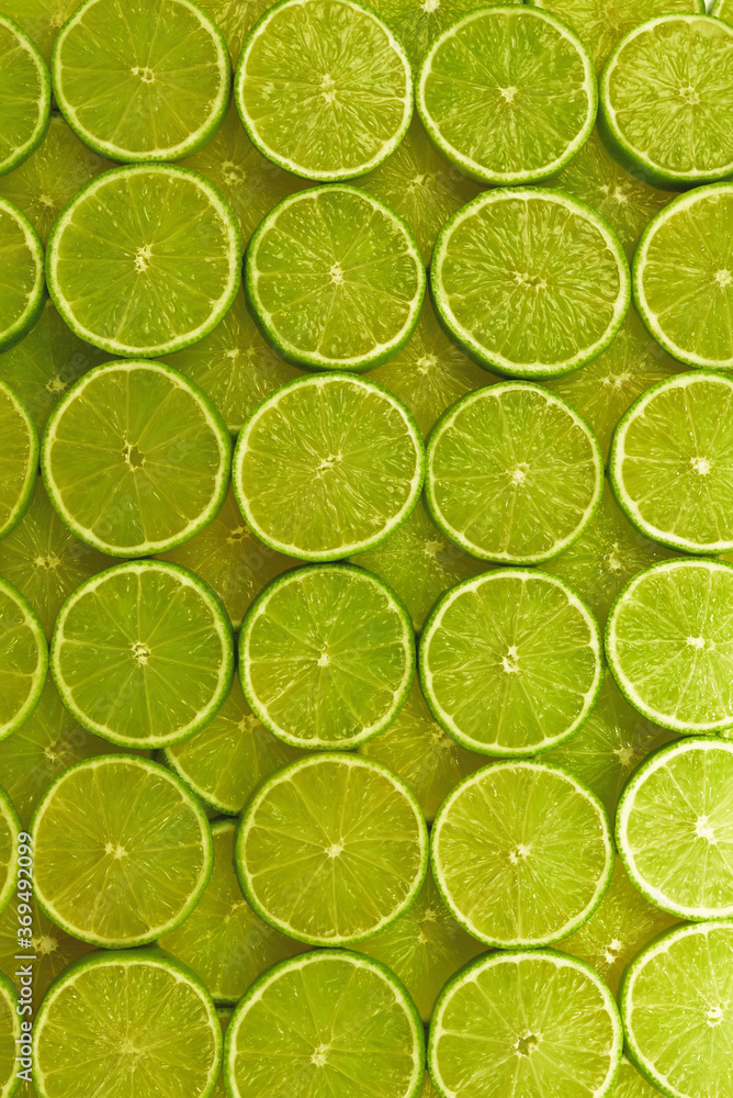 Fresh lime slices as a background. Fresh lime slices as a background.
