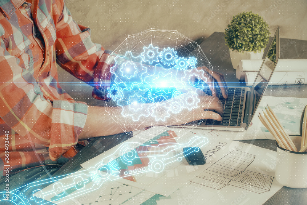 Double exposure of technology hologram with man working on computer background. Concept of big data. Double exposure of technology hologram with man working on computer background. Concept of big data.