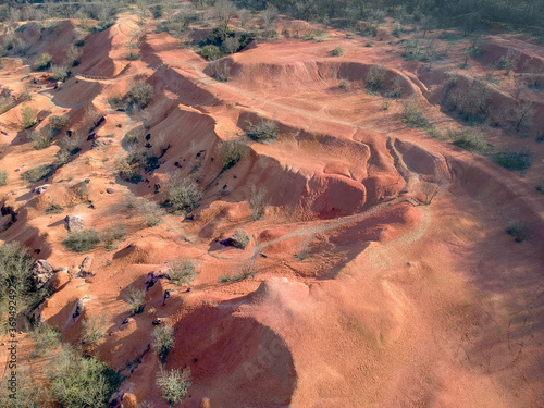 Bauxite mine, raw weathered bauxite sedimentary rock on surface photo