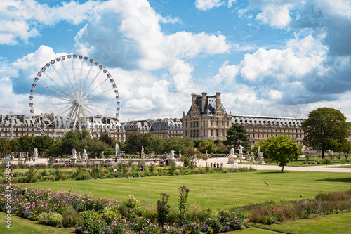 Famous Park "Jardin des Tuileries" with Ferris Wheel next to Louvre Museum © vegefox.com