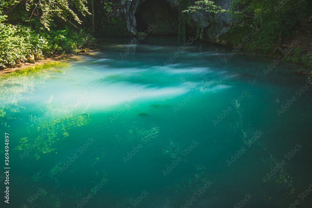 Krupajsko Vrelo (The Krupaj Springs) in Serbia, beautiful water spring with waterfals and caves. Healing light blue water. Krupajsko Vrelo (The Krupaj Springs) in Serbia, beautiful water spring with waterfals and caves. Healing light blue water.