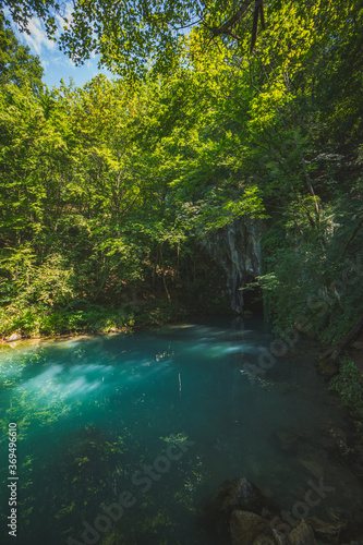 Krupajsko Vrelo  The Krupaj Springs  in Serbia  beautiful water spring with waterfals and caves. Healing light blue water.