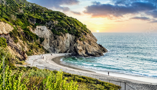View of Strand Beach in Dana Point during sunset