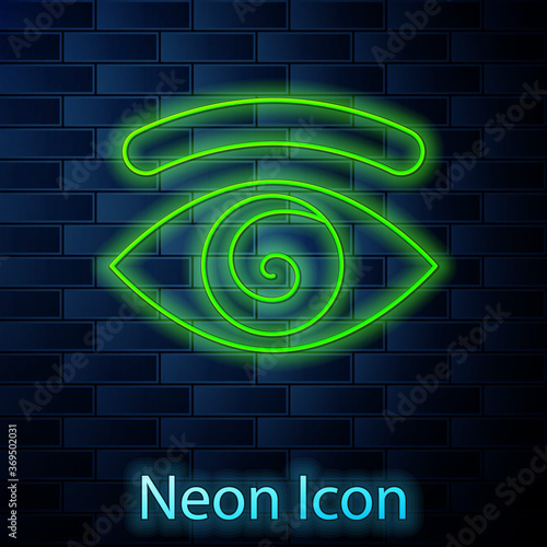 Glowing neon line Hypnosis icon isolated on brick wall background. Human eye with spiral hypnotic iris. Vector.