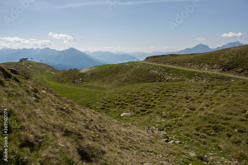 Typical landscape of Austria, summer background. Background with fields, mountains and blue skies 