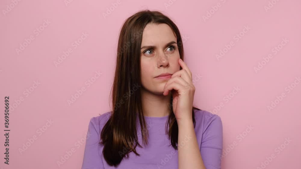 Portrait of thoughtful confused young woman touching chin, scratching head while thinking over solution, brunette girl having doubts about difficult choice, isolated on pink studio background Portrait of thoughtful confused young woman touching chin, scratching head while thinking over solution, brunette girl having doubts about difficult choice, isolated on pink studio background