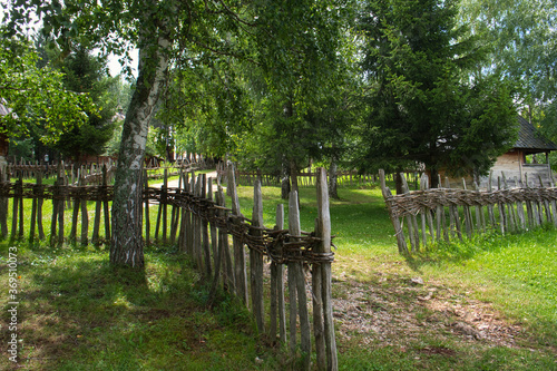 Old traditional village in a mountain valley of Serbia on a rainy summer day 