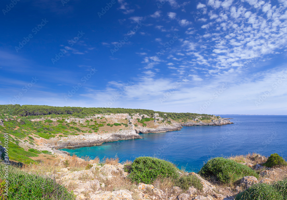 Salento coast: Bay Uluzzo (Lecce), ITALY (Apulia). In the background the city of Gallipoli. Bay Uluzzo is a small natural gulf located within the protected area known as Porto Selvaggio. Salento coast: Bay Uluzzo (Lecce), ITALY (Apulia). In the background the city of Gallipoli. Bay Uluzzo is a small natural gulf located within the protected area known as Porto Selvaggio.
