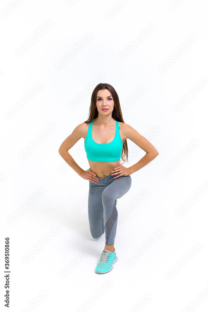 Sporty girl doing exercise on white background Sporty girl doing exercise on white background